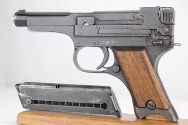 SOLD - Late Type 94 Nambu - Matching Magazine